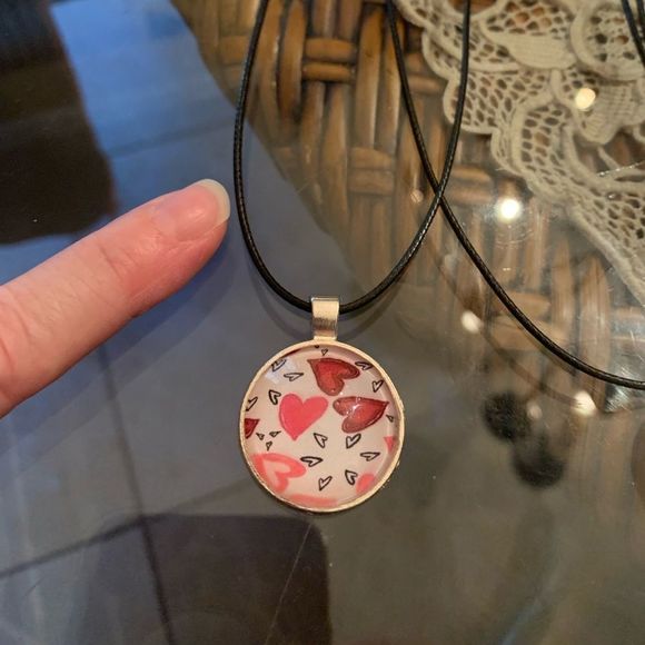 My heart is all aflutter! Silvertone pendant with vegan leather cord - Picture 1 of 2